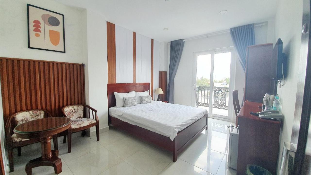 Minh Khue Hotel Виньлонг Экстерьер фото