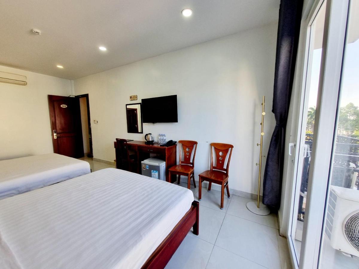 Minh Khue Hotel Виньлонг Экстерьер фото