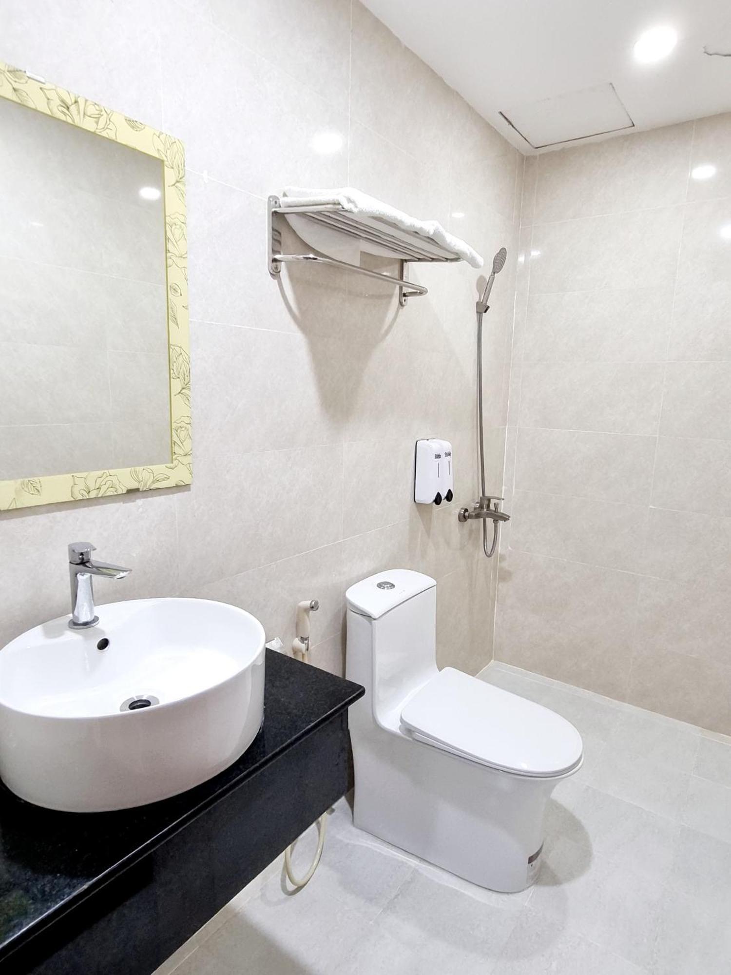Minh Khue Hotel Виньлонг Экстерьер фото